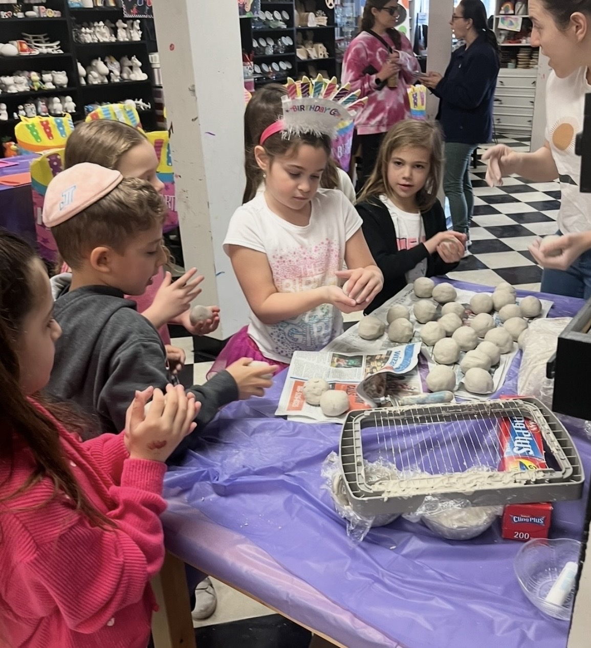 Kids making clay projects
